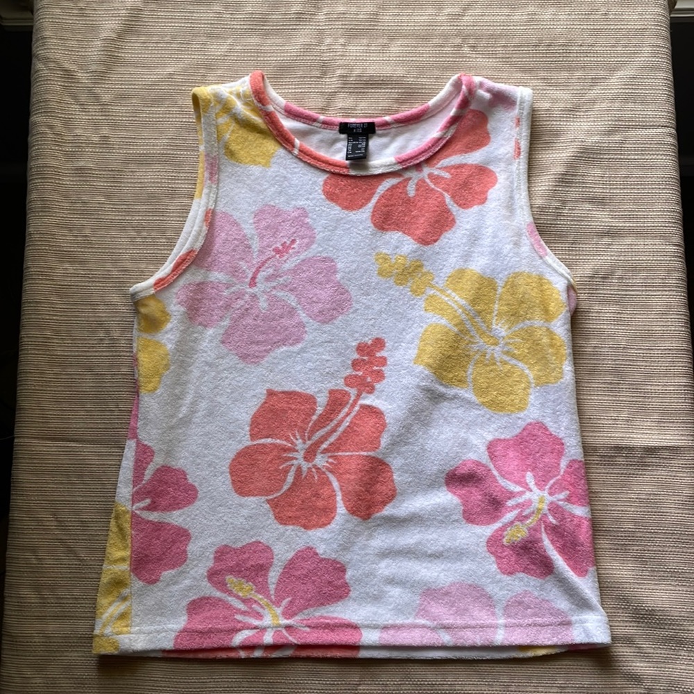 Floral forever 21 kids size 13/14 shirt compared to a 12 inch ruler. Never worn!